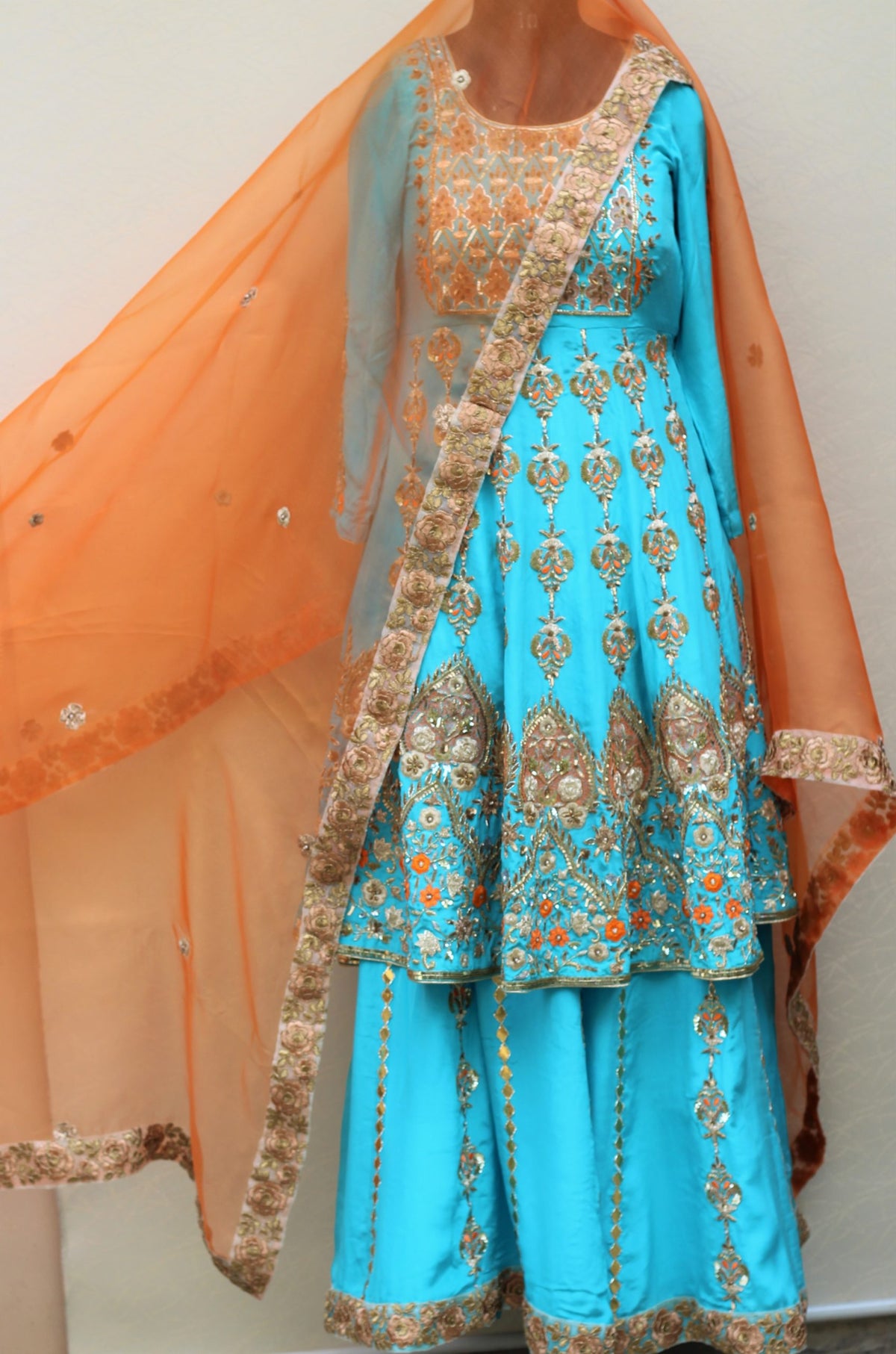 orange and sky blue combination dress Sky blue lehenga with contrast dupatta